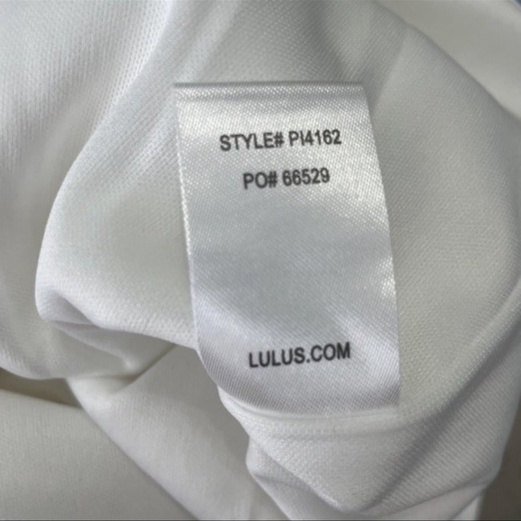 Lulu’s! White off shoulder all in one shorts romper! Flutter sleeves. - Picture 4 of 10